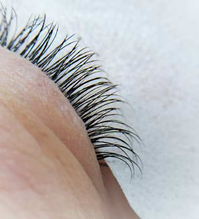 close up of eye with eyelash extensions ,beauty salon treatment. High quality photoの写真素材