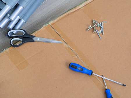 handyman making furniture assembly using tools for repair.の写真素材