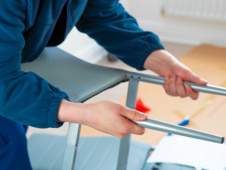 handyman making furniture assembly using tools for repair.の写真素材