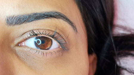close up of eye with eyelash extensions ,beauty salon treatment. High quality photoの写真素材