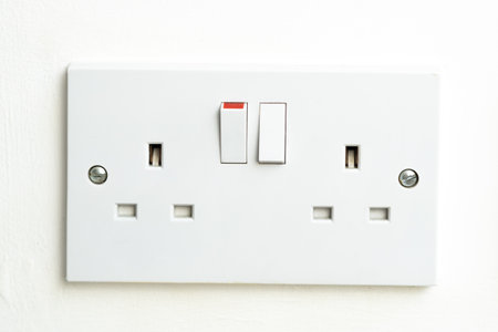 close up of english socket in the wall, electricity billsの写真素材