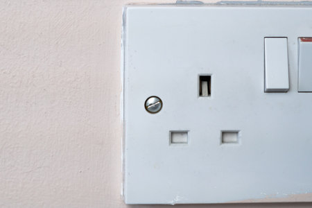 close up of english socket in the wall, electricity billsの写真素材