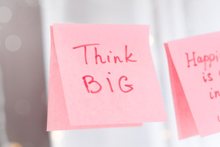 inspirational quotes on pink sticker on the mirror,handwriting text.の写真素材