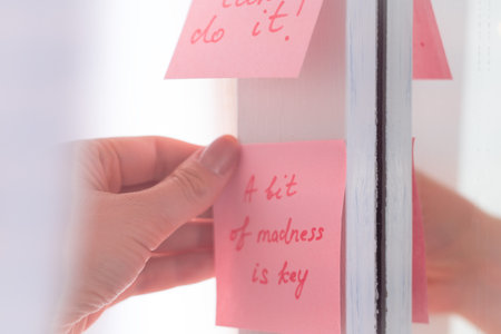 inspirational quotes on pink sticker on the mirror,handwriting text.の写真素材