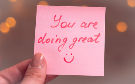 inspirational quotes on pink sticker on the mirror,handwriting text.の写真素材