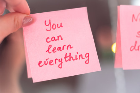 inspirational quotes on pink sticker on the mirror,handwriting text.の写真素材