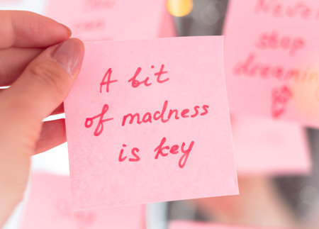 inspirational quotes on pink sticker on the mirror,handwriting text.の写真素材