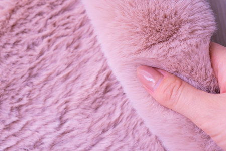pink fur background,fluffy powdery carpet.の写真素材