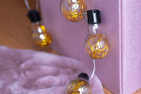 garland with golden lamps, home decor.の写真素材