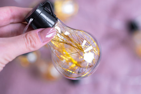 garland with golden lamps, home decor.の写真素材