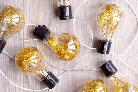 garland with golden lamps, home decor.の写真素材