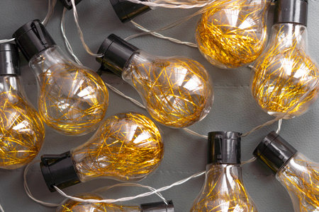garland with golden lamps, home decor.の写真素材