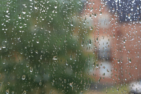drops of rain on the window,wet weather,background