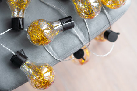 garland with golden lamps, home decor.の写真素材