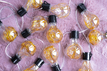 garland with golden lamps, home decor.の写真素材