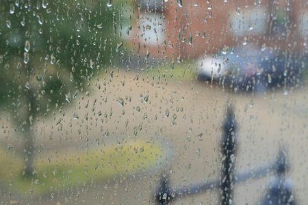 drops of rain on the window,wet weather,backgroundの写真素材
