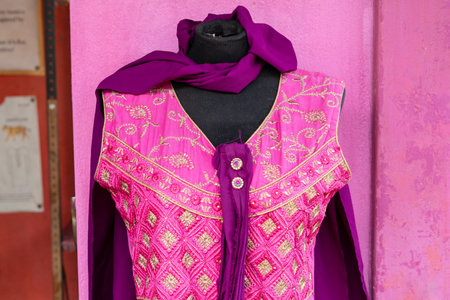 indian colorful pink and purple dress with golden pattern.の写真素材