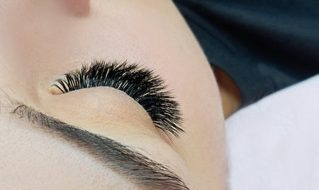 Close up of eye with eyelash extensionsの写真素材