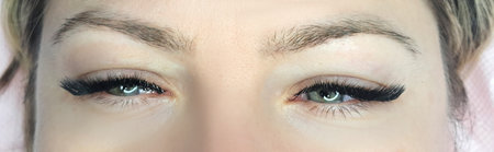 Close up of eye with eyelash extensions ,beauty salon treatment ,2d volume, 3d volume, classical lashes,Russian volume,megavolume, new set.の写真素材