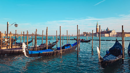Beautiful seascape with gondolas on the blue sea water in Venice. High quality photoの写真素材
