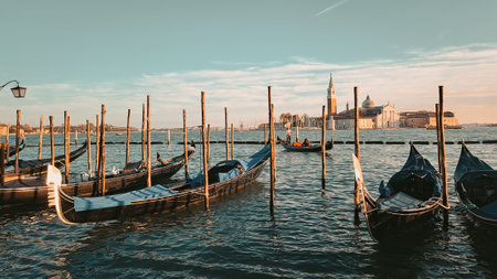 Beautiful seascape with gondolas on the blue sea water in Venice. High quality photoの写真素材