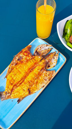 fried fish in seafood restaurant,see view.