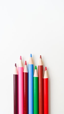 Colorful pencils on a white background, perfect for art developmentの写真素材