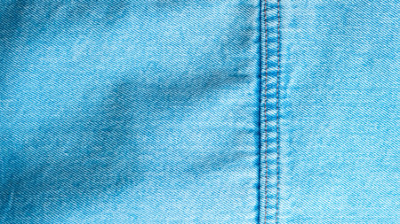 Blue jeans fabric with detailed texture, perfect for fashion and textile design visuals