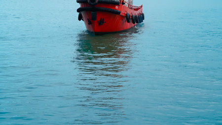 Ships docked at a bustling seaport, surrounded by cranes and containers.の写真素材
