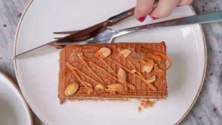 a tasty cake on a table in a cozy cafe, perfect for a break