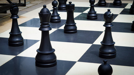 big figures on the chessboard outside.の写真素材