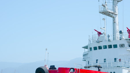 Ship in seaport, deck bathed in summer sunlight, calm and serene.の写真素材
