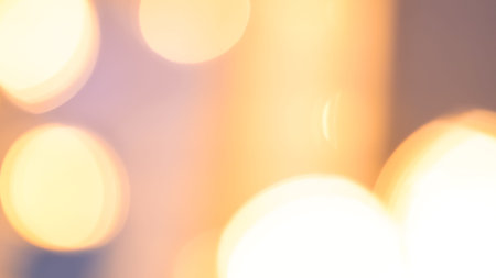 golden blurred bokeh background, festive backdrop.