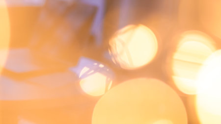 golden blurred bokeh background, festive backdrop.の写真素材