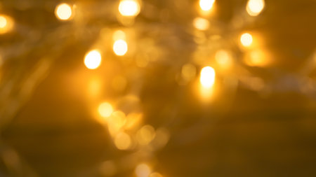 golden blurred bokeh background, festive backdrop.の写真素材