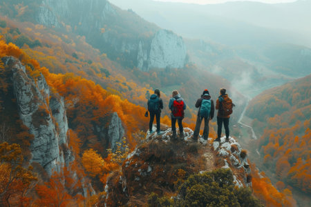 Happy people enjoying cozy mountain tours in autumn, surrounded by colorful foliage.の素材
