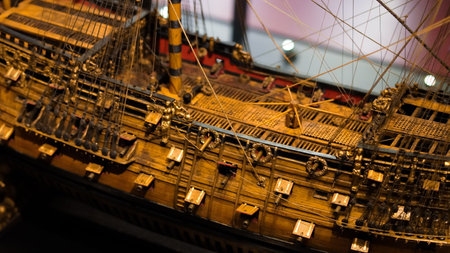 Close-up view of ship models in maritime museum, reflecting ancient sailing vessels..の写真素材