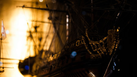 Close-up view of ship models in maritime museum, reflecting ancient sailing vessels..の写真素材