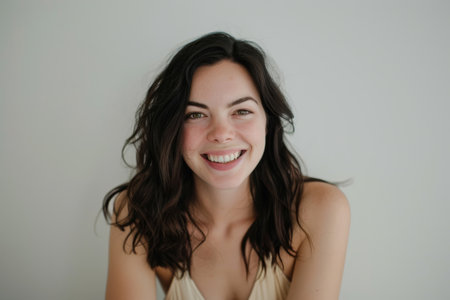 Beautiful brunette woman with dark brown hair, wellness and beauty on white backgroundの素材