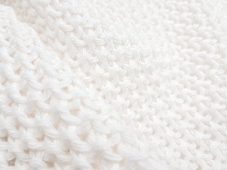 An artistic white knitted plaid background, combining texture and modern minimalist style. High quality photoの写真素材