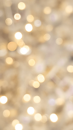 Blurred golden and light brown bokeh background with soft Christmas lights. High quality photoの写真素材