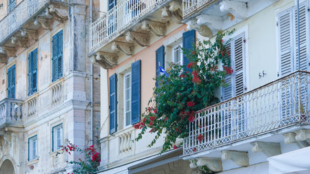 Old European buildings in a quaint old town street with cobblestones and charmの写真素材