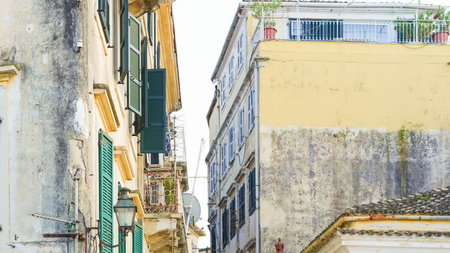 A serene European old town with historic buildings and cobbled streets.の写真素材