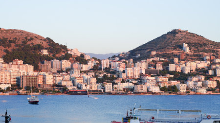 Stunning Albanian sunset over the sea, with Sarande seaside viewsの写真素材