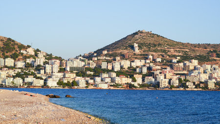Stunning Albanian sunset over the sea, with Sarande seaside viewsの写真素材
