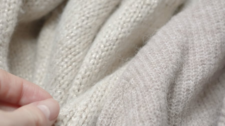 Unique, handcrafted knitted textures with visible craftsmanship and artistry