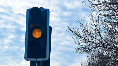 A city intersection with bright lights and cars moving in all directions