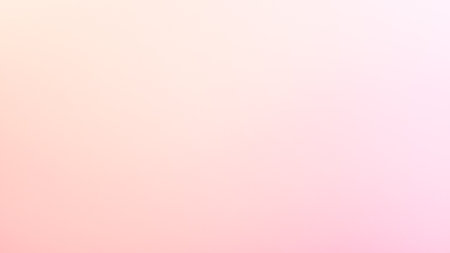 Smooth pink and golden gradient texture creating a warm summer effectの写真素材