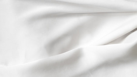 A soft and delicate white drapery with gentle fabric foldsの写真素材