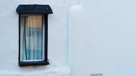 A vintage English window symbolizing nostalgia, introspection, and memories.の写真素材